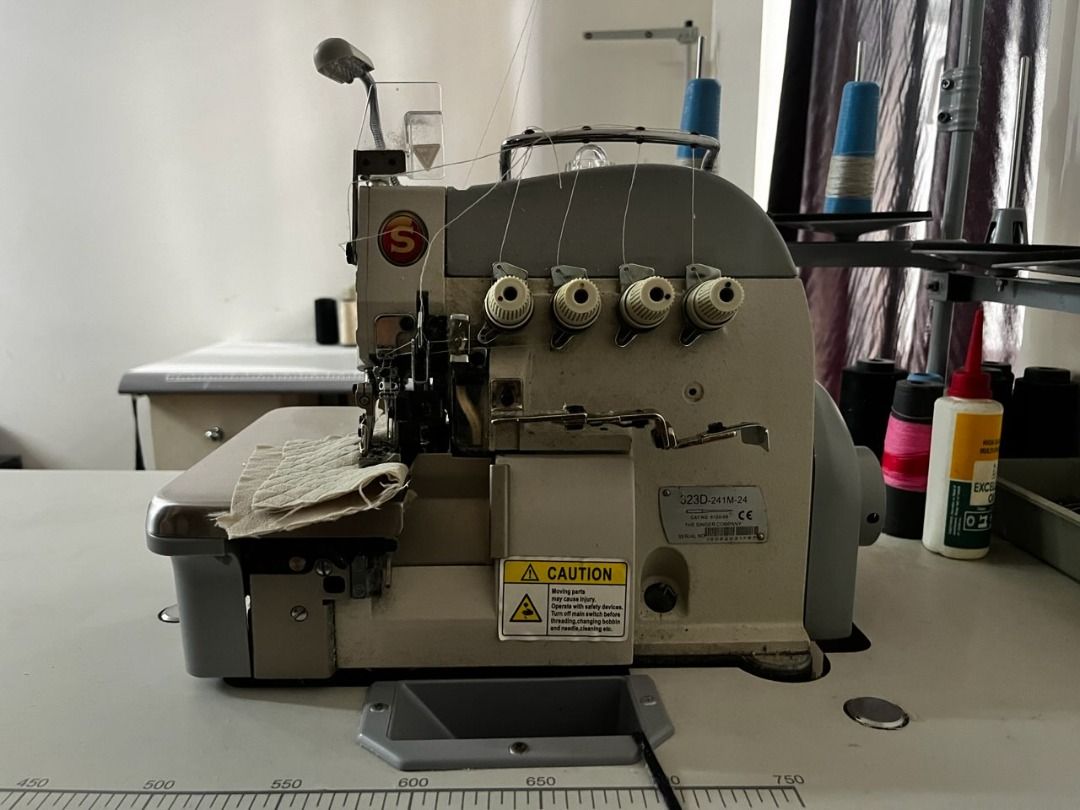 Singer 323D Serger / Edging Machine Industrial Sewing Machine (Category: Other Home Appliances) located in Makati City. Submitted by travelfinds34611 (Listing ID 1458973807, Image 1). Description: Singer 323D Serger / Edging Machine Industrial Sewing Machine •1,300 stitches per minute •3 | 4 | 5 thread capacity •Differential feed •Smoother multi-purpose feeding •Superior fabric feed system •Adjustable tension •Adjustable stitch width & length LOC