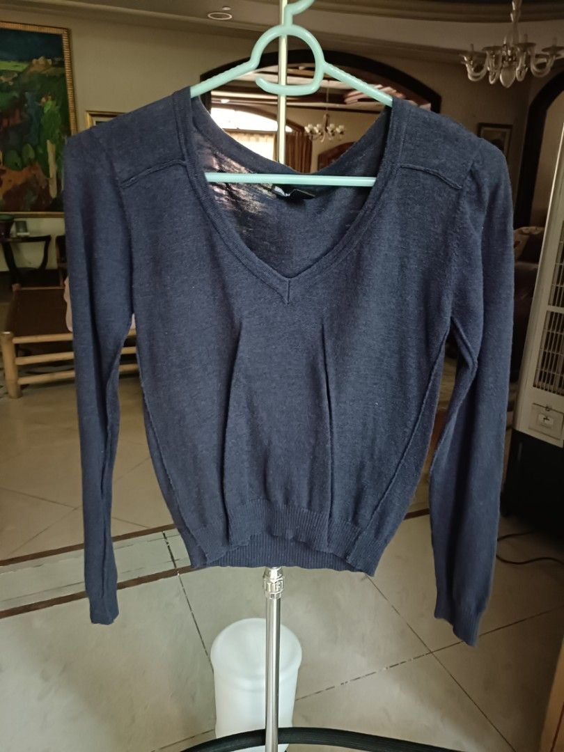Size M MANGO navy blue sweater (Category: Longsleeves) located in Makati City. Submitted by supersellersara (Listing ID 1458928366, Image 1). Description: no stain, no damage. needs to be washed, been in storage for a while high stretch. garter still in good condition GCash paymemt. makati location Strictly no returns or refunds .