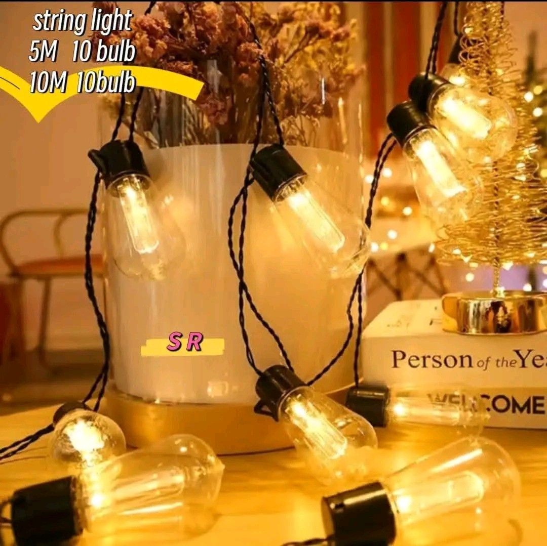 Solar Powered String Lights - 5M/10M, 10 Bulbs, Waterproof (Category: Lighting) located in Manila. Submitted by marvieobordo (Listing ID 1458974500, Image 1). Description: - Solar-powered string lights for outdoor use - Available in 5M or 10M lengths with 10 bulbs - IP65 waterproof rating, suitable for patios, balconies, and camping - Emits a warm, cozy glow for ambiance - No electricity required, easy to set up - Ideal for parties or everyday de