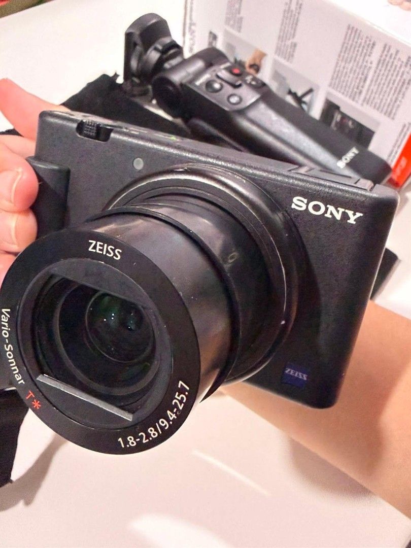 Sony ZV-1 Digital Camera (Category: Cameras) located in Paranaque City. Submitted by jamsx73 (Listing ID 1458986245, Image 3). Description: - Lady owned - Battery, wire charger, and muff included (these are what you get when you purchase it brand new) - Free Sony bluetooth shooting grip (orig price at 6k) and free Ulanzi flash - Has external signs of usage (natanggal na onti yung black paint as seen in 3rd photo) - No issues - Pm for sample video