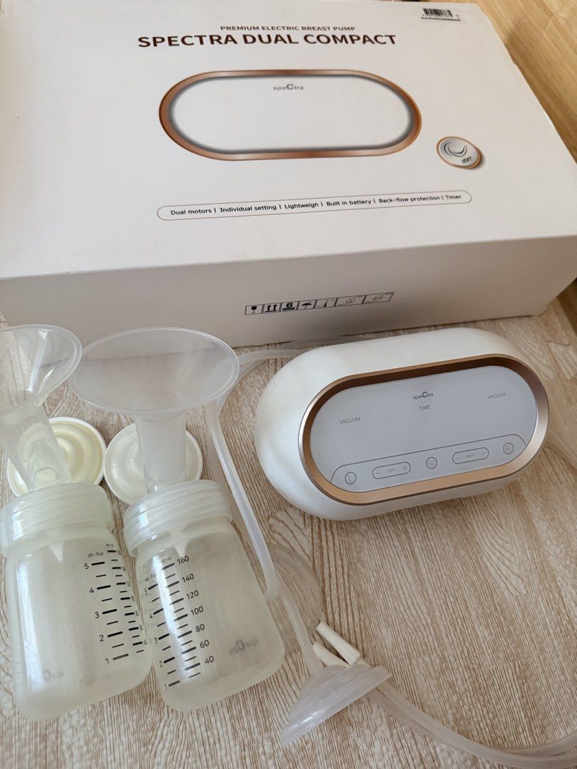 Spectra Dual Compact Premium Electric Breast Pump (Category: Breastfeeding & Bottle Feeding) located in Rizal. Submitted by hmsml1217 (Listing ID 1458903071, Image 1). Description: Original price is - Spectra Dual Compact electric breast pump - Dual motors with individual settings - Lightweight and portable design - Built-in rechargeable battery - Back-flow protection - Integrated timer - Includes pump, bottles, and tubing - Easy to use for busy 