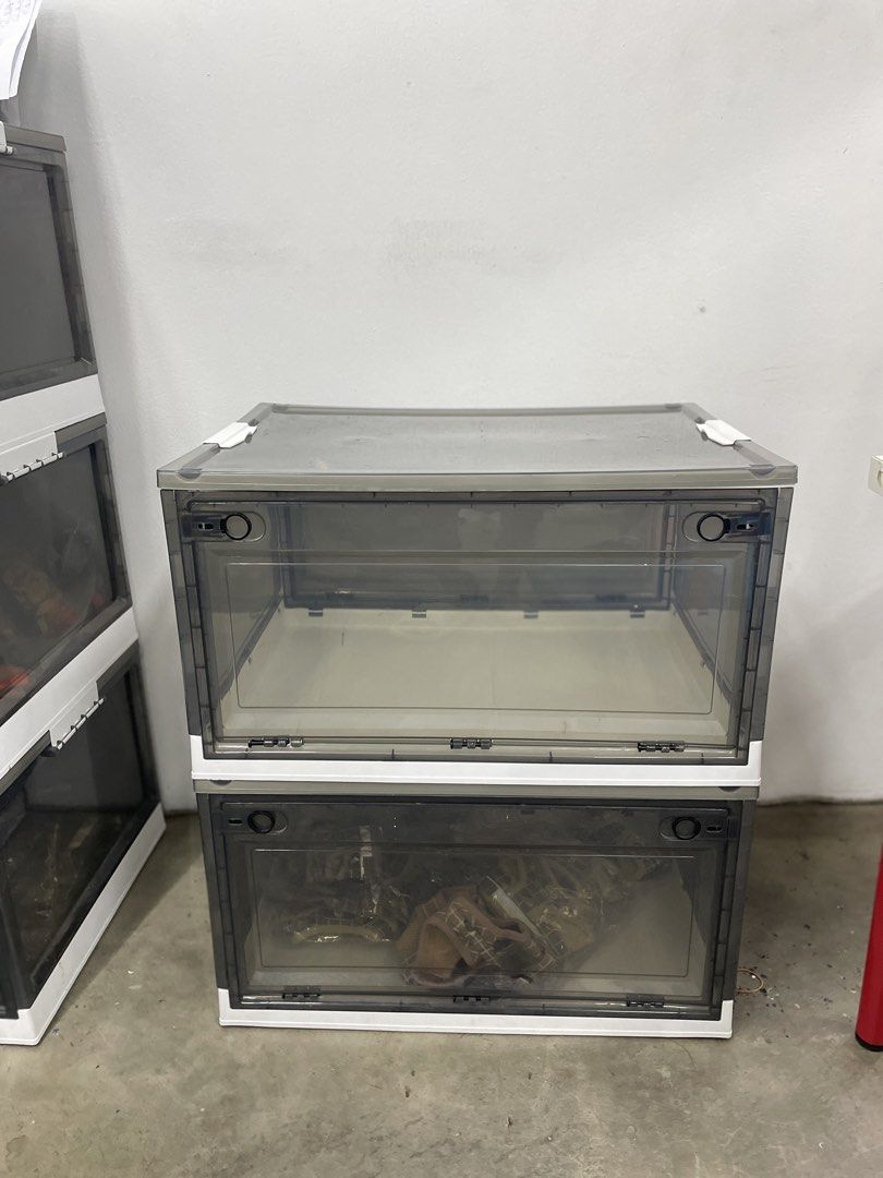 Stackable Clear Storage Boxes with Lids (Category: Storage Boxes & Baskets) located in Kuala Lumpur. Submitted by br815 (Listing ID 1458894238, Image 1). Description: Pick up at Taman Petaling Utama - Stackable storage boxes to maximize space. - Clear front panel for easy visibility of contents. - Convenient front door for quick access. - Ideal for organizing shoes, clothes, toys, and more. - Approximate dimensions: 18" (Height) x 14" (Width) x 1