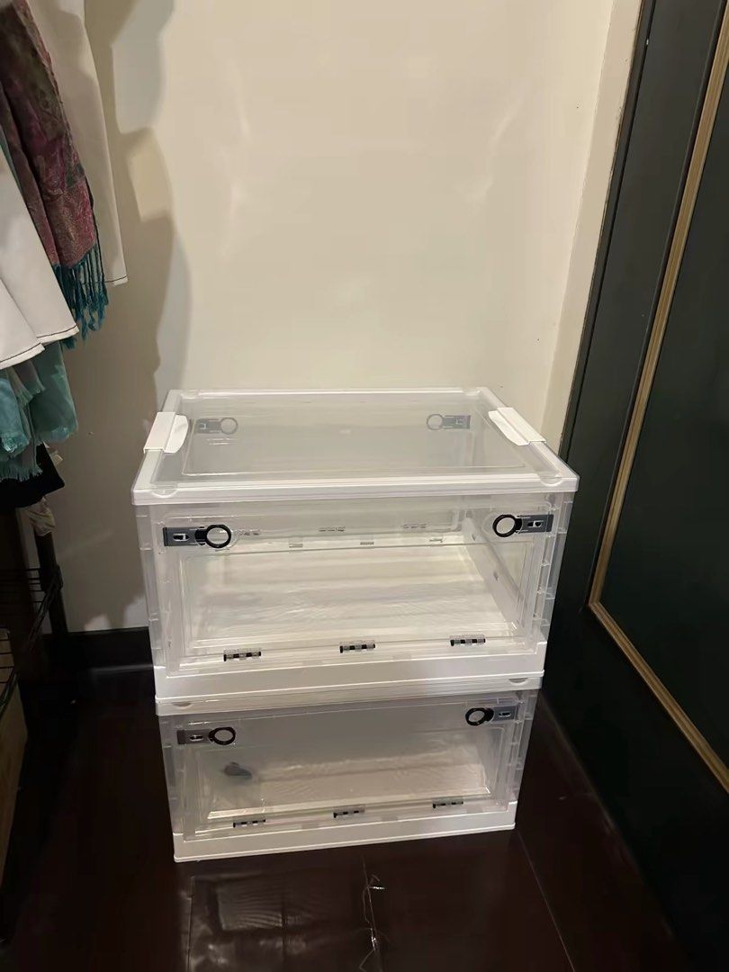 Stackable Clear Storage Boxes with Lids (Category: Storage Boxes & Baskets) located in Singapore. Submitted by celine9988 (Listing ID 1458970979, Image 1). Description: 1 piece- $5 / 4 pieces- $15 - Front opening doors with secure latches - Ideal for organizing clothes, shoes, toys, and more - Stackable design for space-saving storage - Easy to assemble and use - Helps keep your living space neat and tidy.