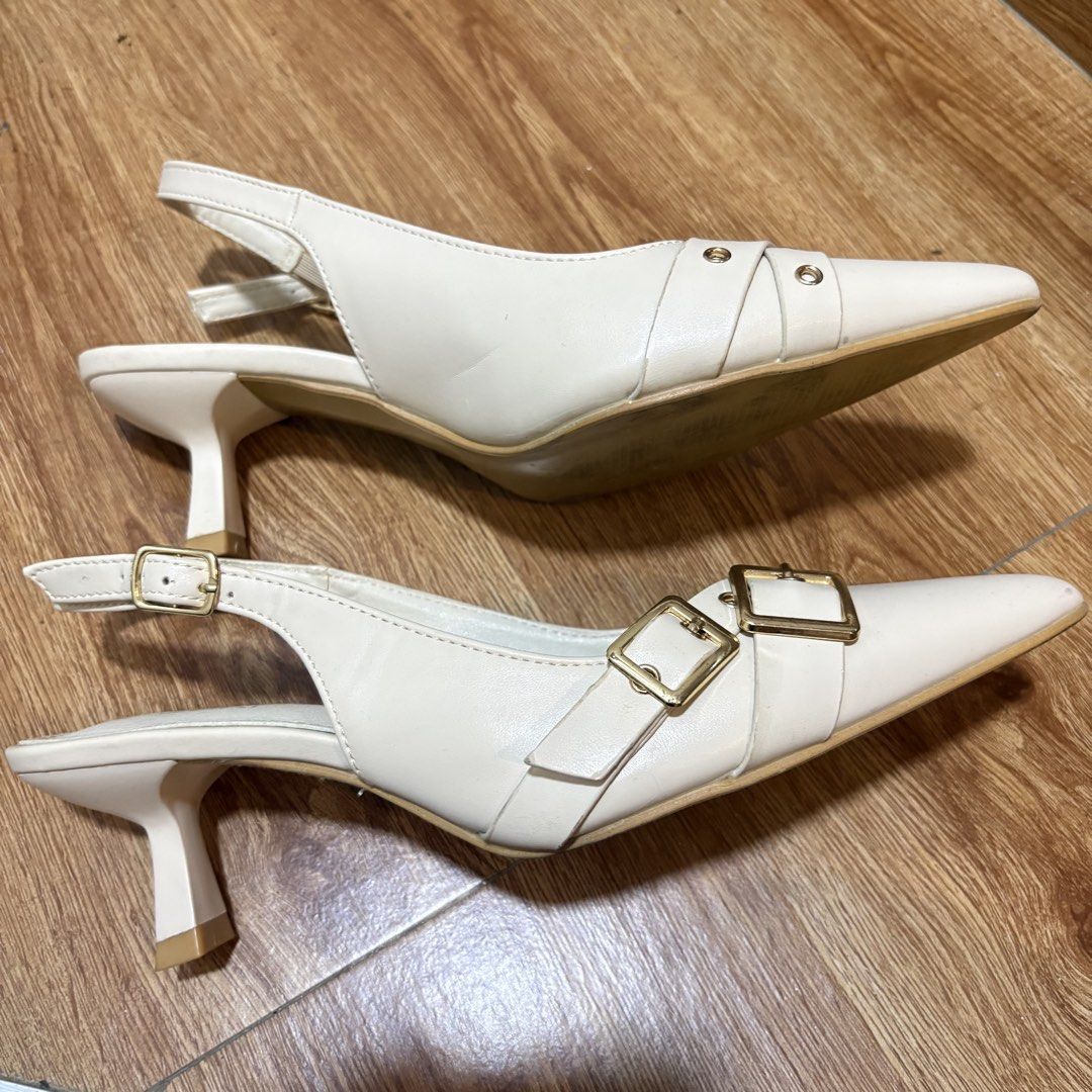 Suki Beige Kitten Slingback Heels (Category: Heels) located in Navotas City. Submitted by kathyp10 (Listing ID 1459001082, Image 3). Description: - Brand: Suki - Style: Kitten Slingback Heels - Color: Beige - Size: EU 38 (UK 5 / US 7) - Features: Pointed toe, decorative buckle strap, slingback design - Condition: Good (Pre-loved) -Price negotiable for sure buyers MOP: Gcash, GoTyme MOD: Lalamove, J&T.