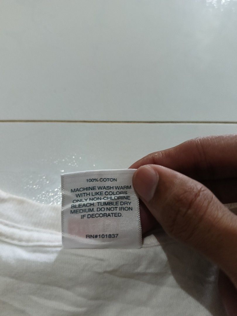 Supreme mid logo white shirt (Category: Tshirts & Polo Shirts ) located in Naga. Submitted by just_thrift2.0 (Listing ID 1458988635, Image 3). Description: Size large dimes 20x26 condition: Excellent color rate 9.5/10 no issue need wash lang complete tags.