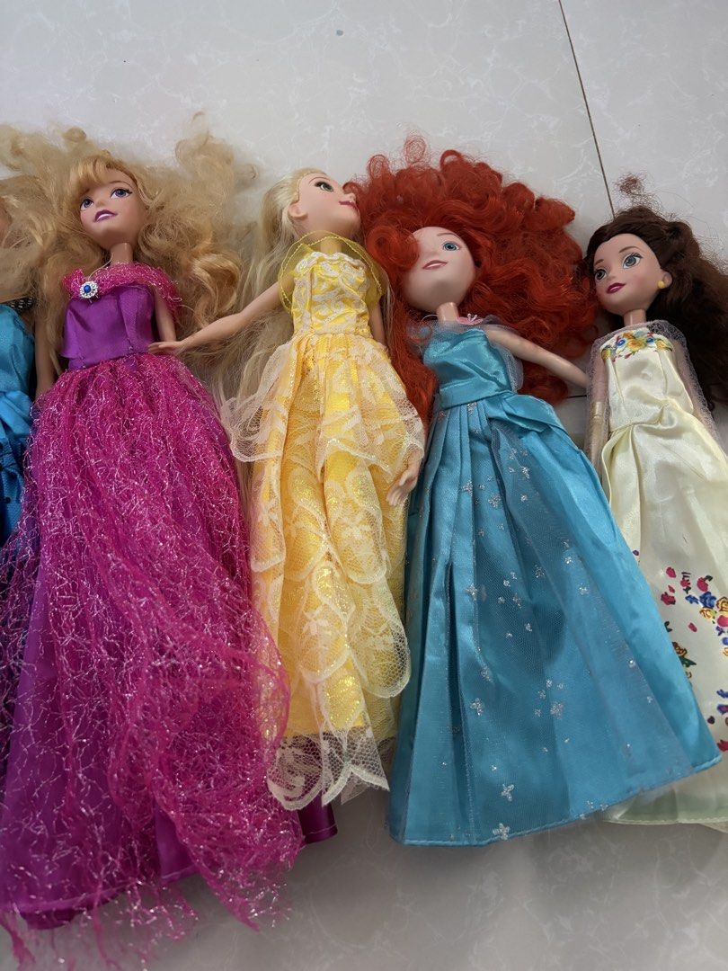 Take all Disney Princess dolls (Category: Kids Toys) located in Las Pinas. Submitted by bibliomomma (Listing ID 1458918227, Image 3). Description: Selling my collection of 7 barbie dolls, all in good pre-loved condition and kept together as a set. The dolls are original, but please note that the dresses have been replaced with dresses purchased from Amazon, so they are not the original outfits. There may be some signs of age and wear from play, a