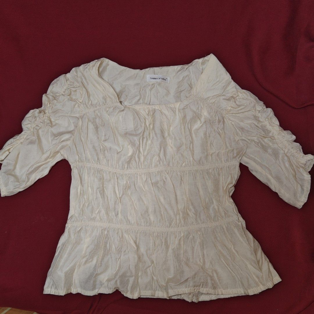 Tammy Studio Cream Square Neck Ruched Blouse (Category: Blouses) located in San Fernando. Submitted by decluttwv (Listing ID 1459041598, Image 1). Description: Fits s-m.