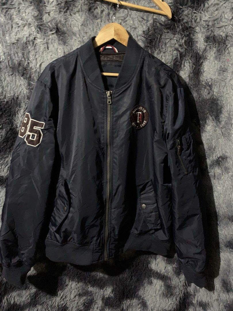 Tommy bomber Jacket (Category: Coats, Jackets and Outerwear) located in Manila. Submitted by etchelverano (Listing ID 1459022067, Image 1). Description: Tommy Bomber Jacket Excellent condition No issue Color rate 10/10 Size XL Dimes L28 W26.