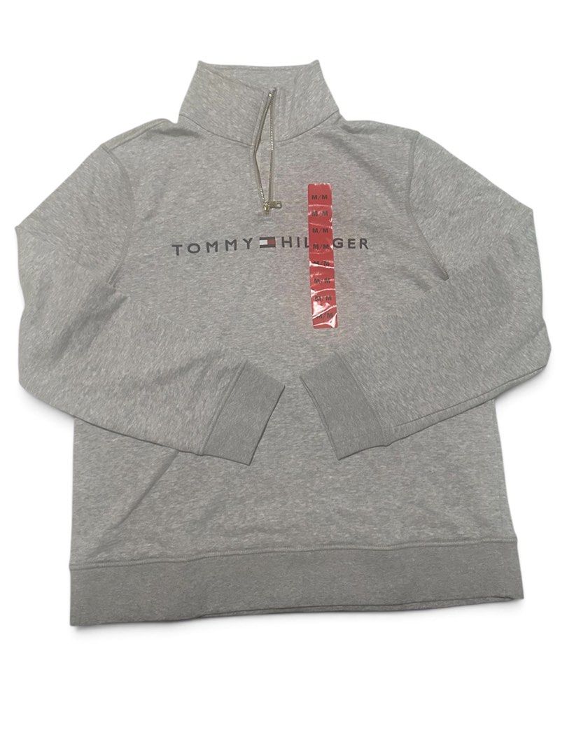 Original Brand New TH Grey Zip Sweatshirt Medium (Category: Coats, Jackets and Outerwear) located in Quezon City. Submitted by peach_o (Listing ID 1458920979, Image 1). Description: Purchased from Costco. Can be unisex since the size runs big.