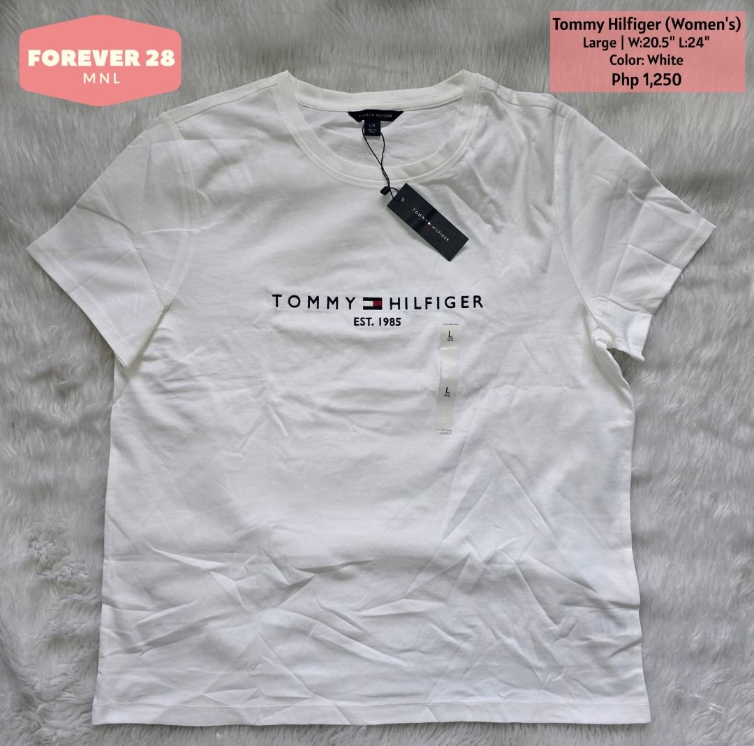 Tommy Hilfiger (Women's Large) (Category: Shirts) located in Manila. Submitted by forever28mnl (Listing ID 1458931302, Image 1). Description: Tommy Hilfiger (Women's) Large | White Php 1,250 ($54.50 on tag) Original from Canada🇨🇦.