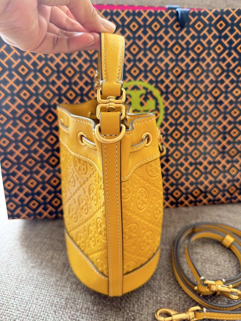 Tory Burch Mini Bucket Bag (Category: Community) located in Paranaque City. Submitted by kristin_llena (Listing ID 1458911783, Image 3). Description: 💛 Calling all yellow lovers! 💛 Something bright, fresh, and beautiful is here! ✨🌻 Check out newest addition and let a little sunshine into your day. ☀️💛 This brand new Tory Burch mini bucket bag ₱11,800 only Don’t miss out—grab and yours now! 💫 Pay today. Ship today!.
