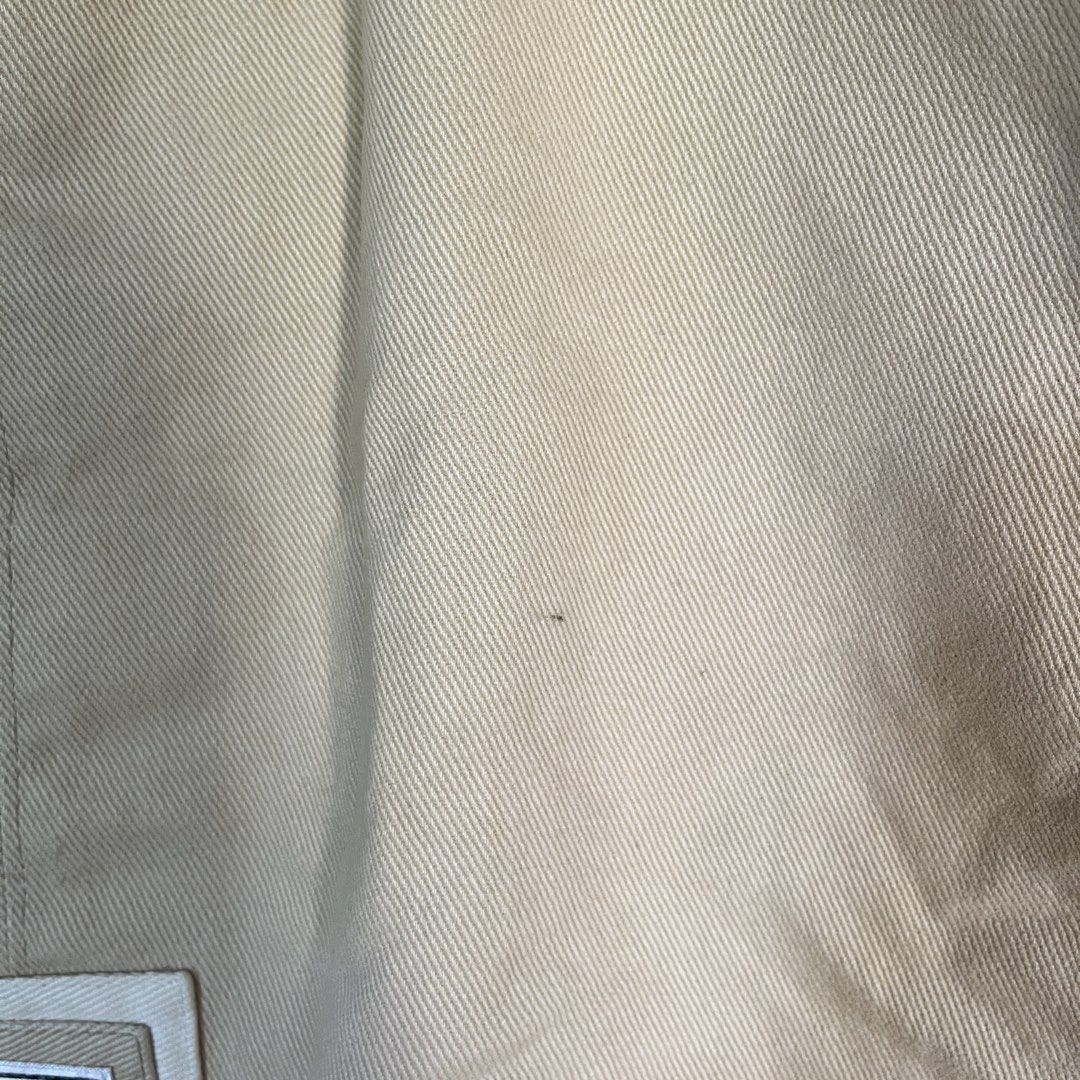 Tote & Beyond Beige Canvas Tote Bag (Category: Tote Bags) located in Las Pinas. Submitted by solfits (Listing ID 1458899169, Image 2). Description: - Simple beige canvas tote bag - Snap closure at the top - Interior pocket for essentials - Minor marks on inside lining - Tiny dark speck on exterior fabric.