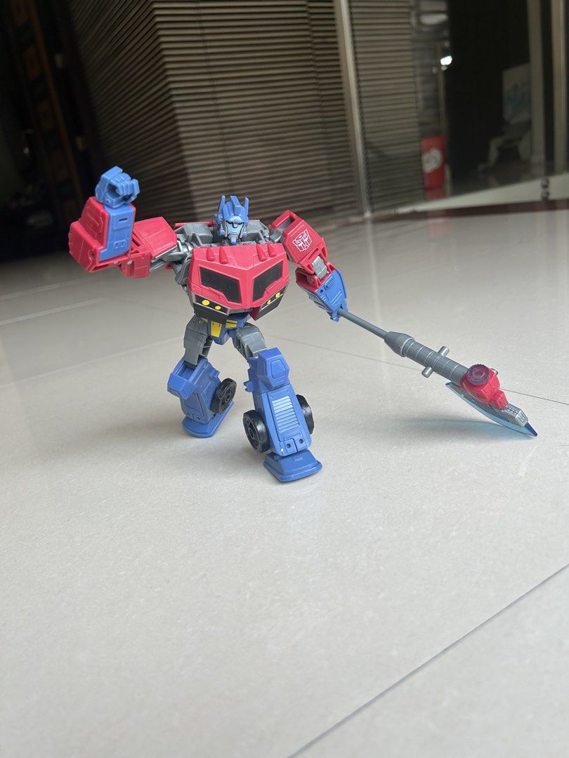 Transformers Generations Legacy United Optimus Prime Voyager Class (Category: Action & Battle Toys) located in Quezon City. Submitted by yannyy001 (Listing ID 1458947794, Image 3). Description: - Transformers Generations Legacy United Voyager Class Optimus Prime figure. - Comes with axe and spear accessories. - Transforms into vehicle mode. - Highly poseable with multiple articulation points. - Perfect for any Transformers fan..