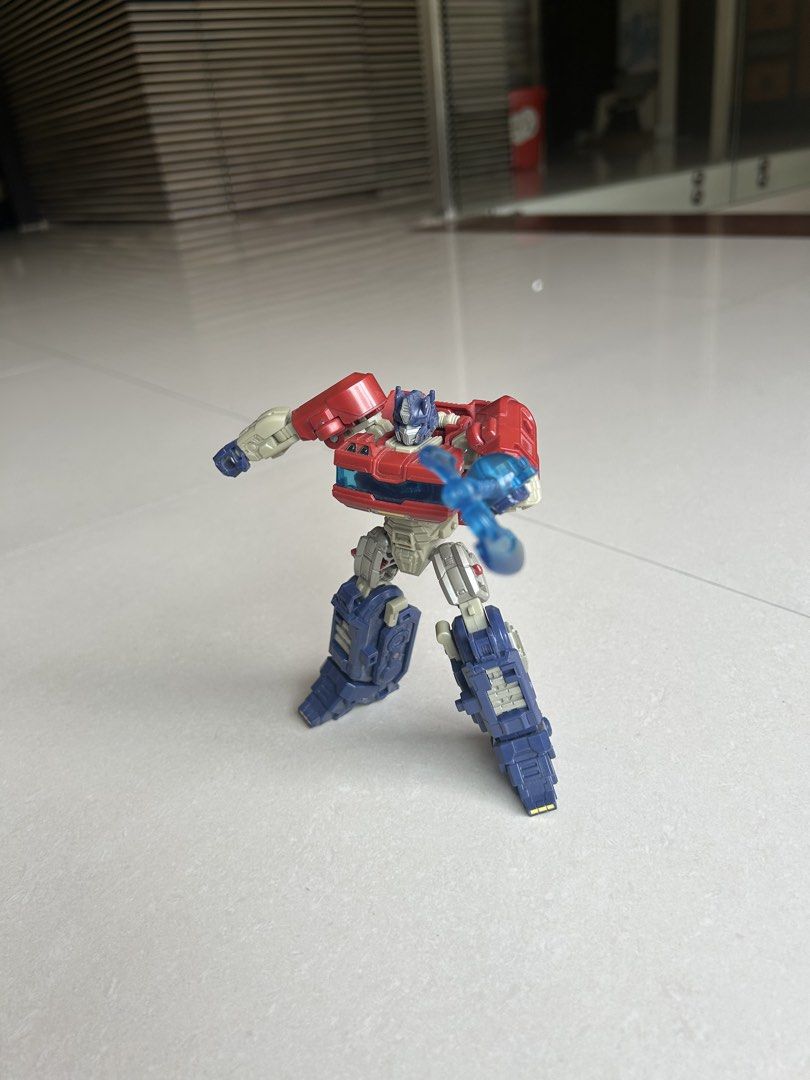 Transformers Studio Series 112 Optimus Prime Action Figure (Category: Figurines & Statues) located in Quezon City. Submitted by dayanny (Listing ID 1458947875, Image 1). Description: - Transformers Studio Series 112 Optimus Prime figure. - Includes signature axe accessory. - Ideal for any Transformers enthusiast. - Perfect for display or play..