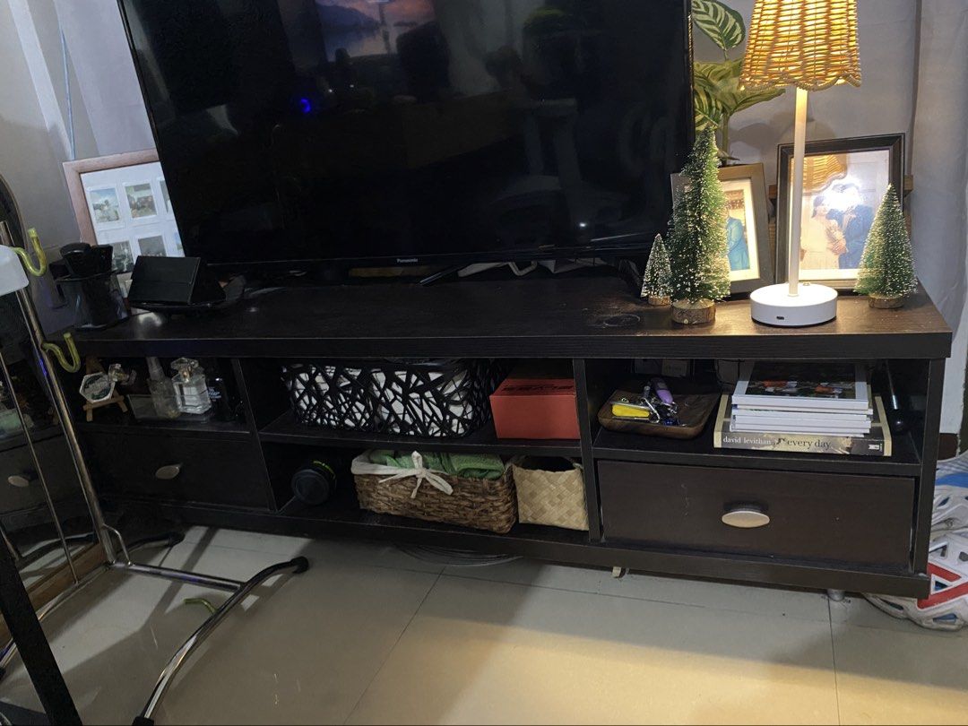 TV rack cabinet (Category: Shelves, Cabinets & Racks) located in Rizal. Submitted by julsdeclutterss (Listing ID 1447601638, Image 1). Description: Madumi lang pero tibay yan haha Cabinets are all working Length 55 inches Height 17 inches .