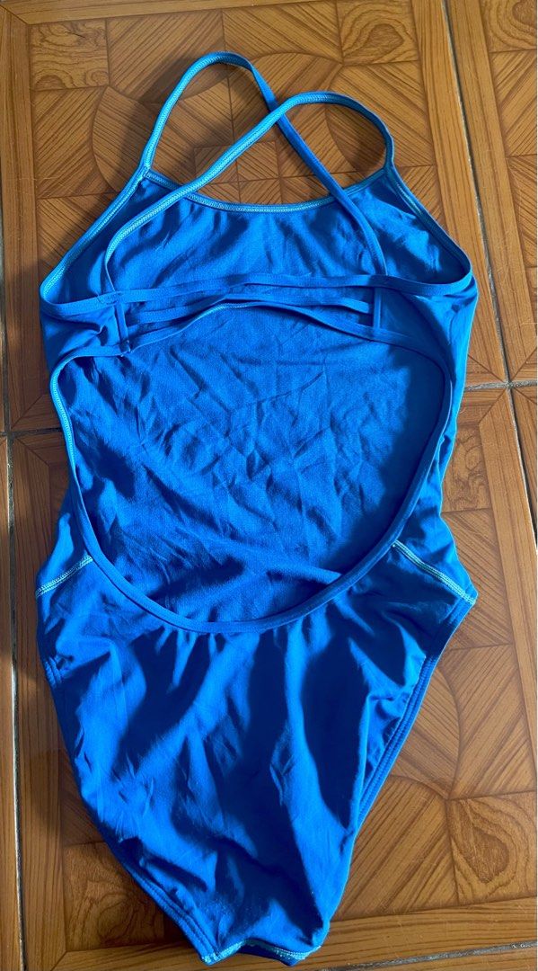 TYR Blue One-Piece Swimsuit (Category: Bikinis & Swimsuits) located in Manila. Submitted by rare_goldy (Listing ID 1459020536, Image 2). Description: - Stylish blue one-piece swimsuit - Features a sporty racerback design - Criss-cross straps for a secure and fashionable fit - Flattering high-cut leg - Ideal for swimming, training, or lounging by the pool or beach.