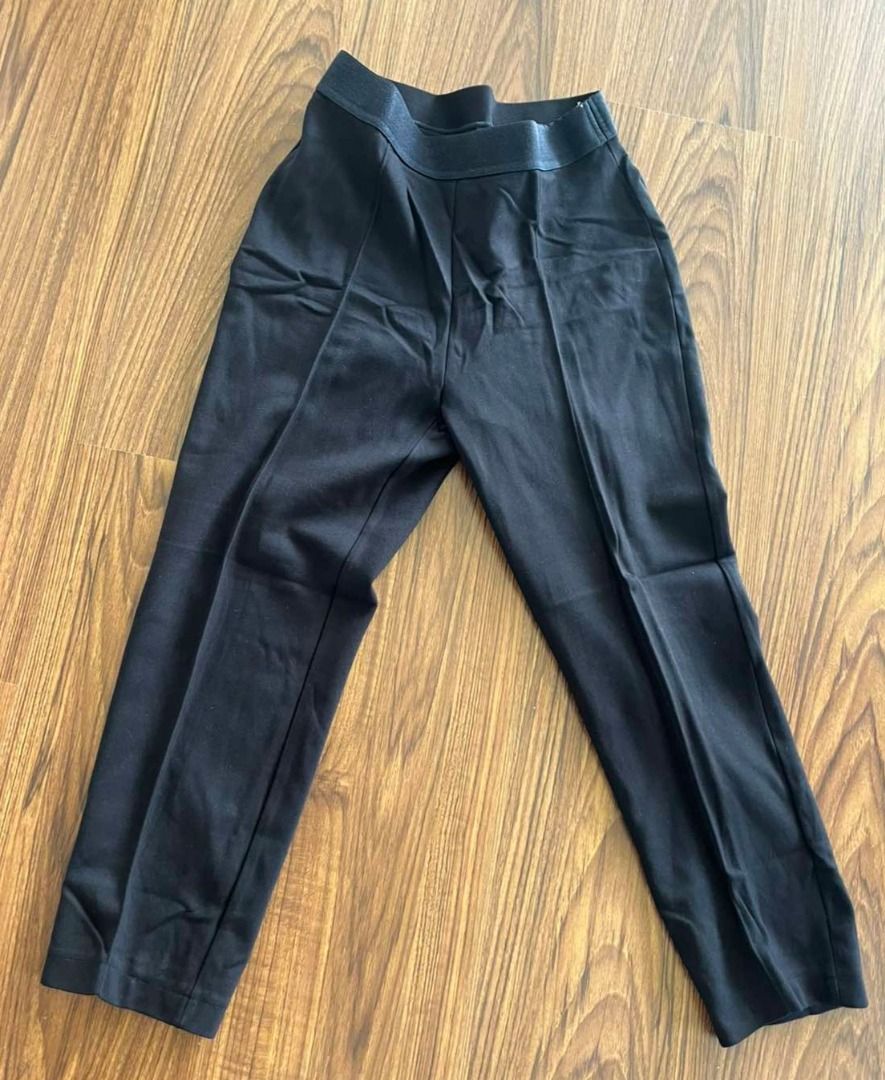 Uniqlo Black Pants Size S (Category: Other Bottoms) located in Santa Rosa. Submitted by bsuiza (Listing ID 1458928055, Image 1). Description: - Uniqlo Black Pants - Made in Vietnam - Size S (fits waist 60-66cm) - Comfortable fabric blend (rayon, nylon, spandex, polyester, cotton) - Versatile for everyday wear.