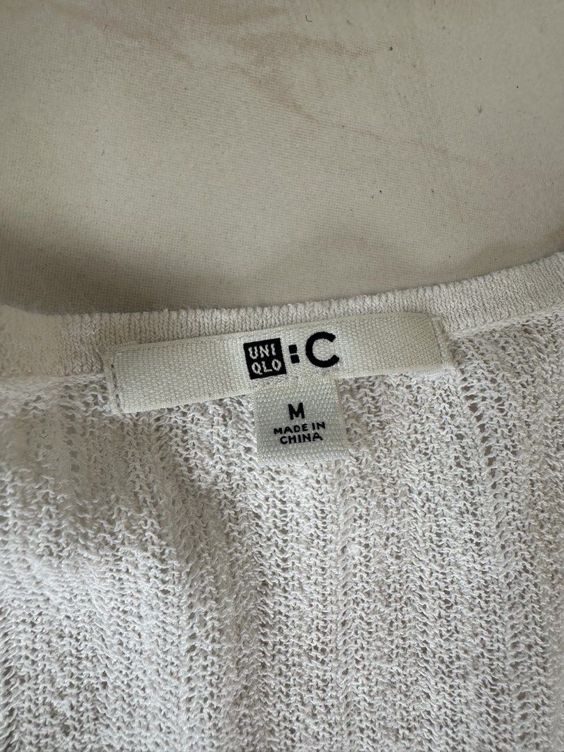 Uniqlo cardigan white (Category: Coats, Jackets and Outerwear) located in Manila. Submitted by marielpit11241 (Listing ID 1459014705, Image 2). Description: Authentic Size M on tag Good as new condition No issue Location: Guadalupe.