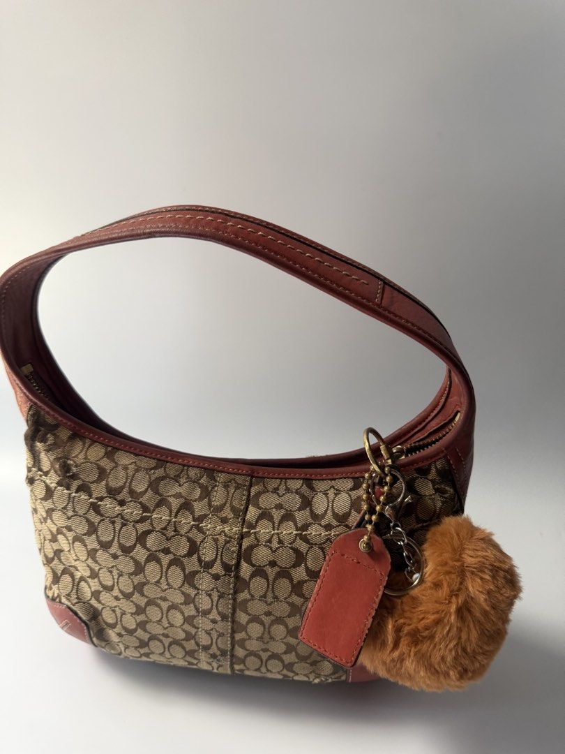 (SOLD) Vintage Coach Ergo Shoulder Bag (Category: Shoulder Bags) located in Mandaluyong City. Submitted by n444m (Listing ID 1458945142, Image 3). Description: Vintage Coach Ergo Shoulder Bag (Reposted) -Has flaws, can cover up using patches -free charm -negotiable :)).