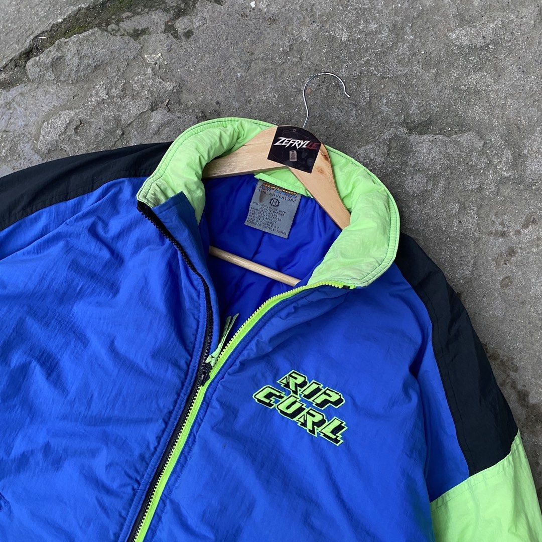 VINTAGE RIP CURL 90s WINDBREAKER JACKET (Category: Coats, Jackets and Outerwear) located in Manila. Submitted by zefrylle_co (Listing ID 1459007160, Image 3). Description: VINTAGE RIP CURL 90s WINDBREAKER 🌊 Size M | Color: Electric Blue + Neon Green Big back hit | Embroidered logos Nylon shell | Made in Taiwan Grail surf piece. 9.5/10 condition Ship nationwide.