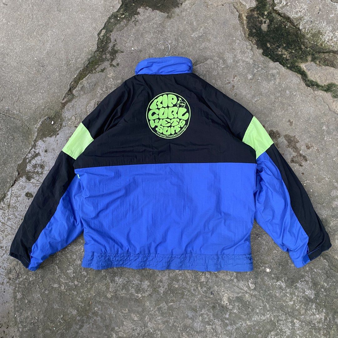 VINTAGE RIP CURL 90s WINDBREAKER JACKET (Category: Coats, Jackets and Outerwear) located in Manila. Submitted by zefrylle_co (Listing ID 1459007160, Image 2). Description: VINTAGE RIP CURL 90s WINDBREAKER 🌊 Size M | Color: Electric Blue + Neon Green Big back hit | Embroidered logos Nylon shell | Made in Taiwan Grail surf piece. 9.5/10 condition Ship nationwide.