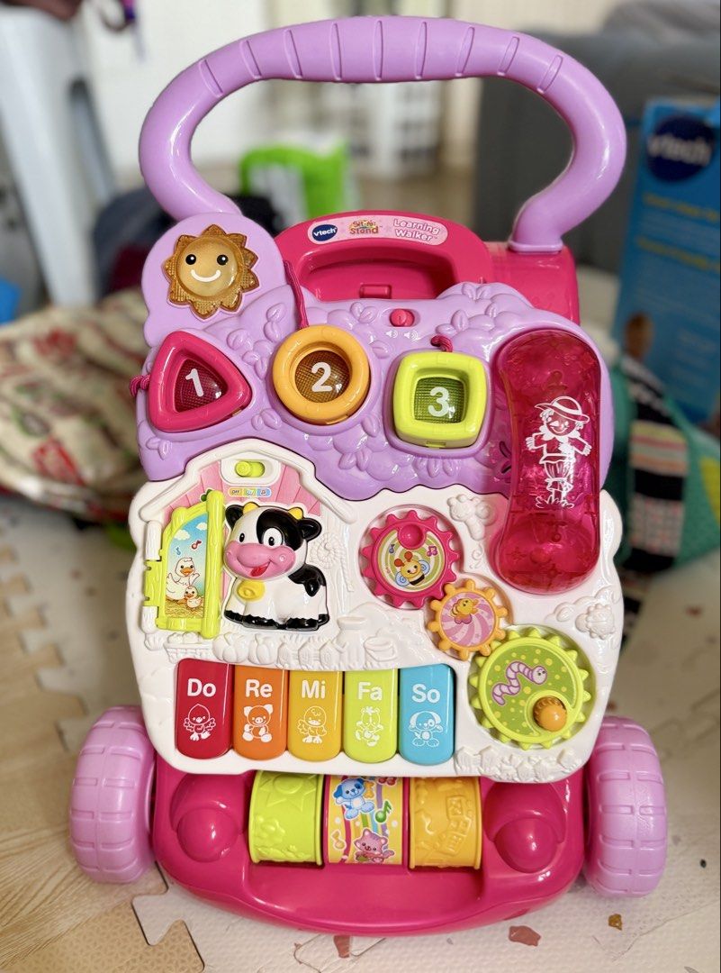 VTech Sit-to-Stand Learning Walker Pink Musical Toy (Category: Infant Playtime) located in Marikina City. Submitted by ishietorio (Listing ID 1458913449, Image 1). Description: Excellent used condition and cleaned before packing back to its box. Looks almost new! Makintab pa All buttons are still working. Lights and sounds are all working perfectly. Para kang bumili ng bago sa mall but with a very low price. I can send you videos as proof of curr