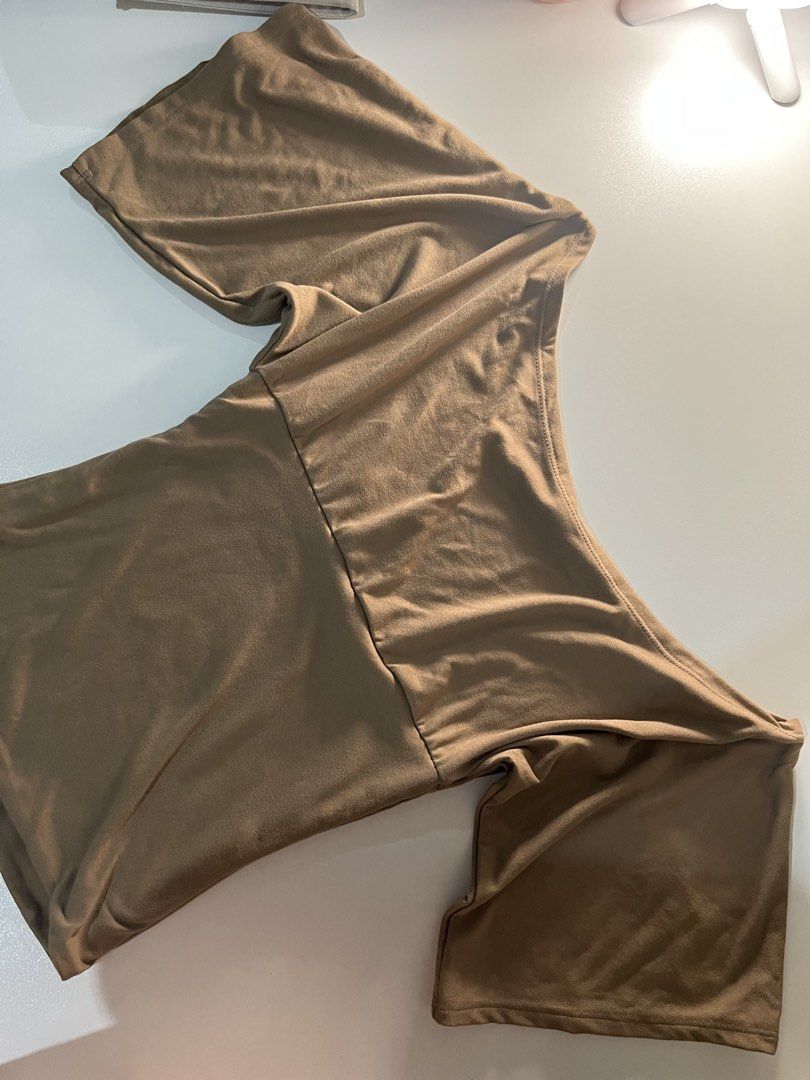 VXN top (Category: Blouses) located in Pilar. Submitted by kimberlynicoledg (Listing ID 1458896941, Image 3). Description: Used once for video filming only. Color TAUPE size XS .