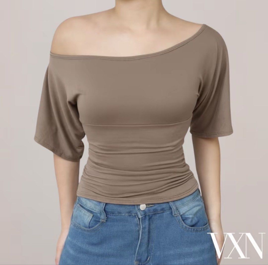 VXN top (Category: Blouses) located in Pilar. Submitted by kimberlynicoledg (Listing ID 1458896941, Image 2). Description: Used once for video filming only. Color TAUPE size XS .