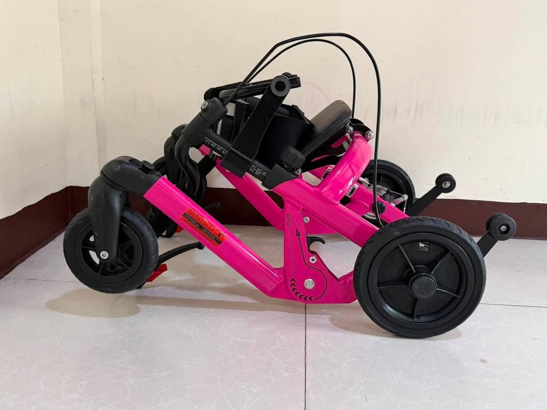 Walker with Seat and Harness (Category: Rehabilitative Devices) located in Cainta. Submitted by vanessa.09 (Listing ID 1459038479, Image 1). Description: For sale 🦽 Schuchmann Malte Outdoor Special Needs Stroller ✅ Brand/Model: Schuchmann Malte Outdoor (Germany) ✅ Specs: Size 1, Max Load: 30kg, ✅ Frame: Lightweight durable alloy, bright pink finish, foldable ✅ Features: All-terrain wheels, hand-brake system, adjustable backrest, secure mounting,