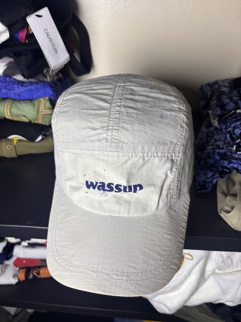 Wassup 5 Panel Cap (Category: Caps & Hats) located in San Jose. Submitted by galitsabarat (Listing ID 1458904299, Image 2). Description: EXCELLENT CONDITION NO PINHOLES NO TEARINGS NEEDS CLEANING ONLY - Lightweight 5-panel cap - Features 'wassup' embroidery on the front - Adjustable strap at the back for a comfortable fit - Ideal for everyday casual wear.