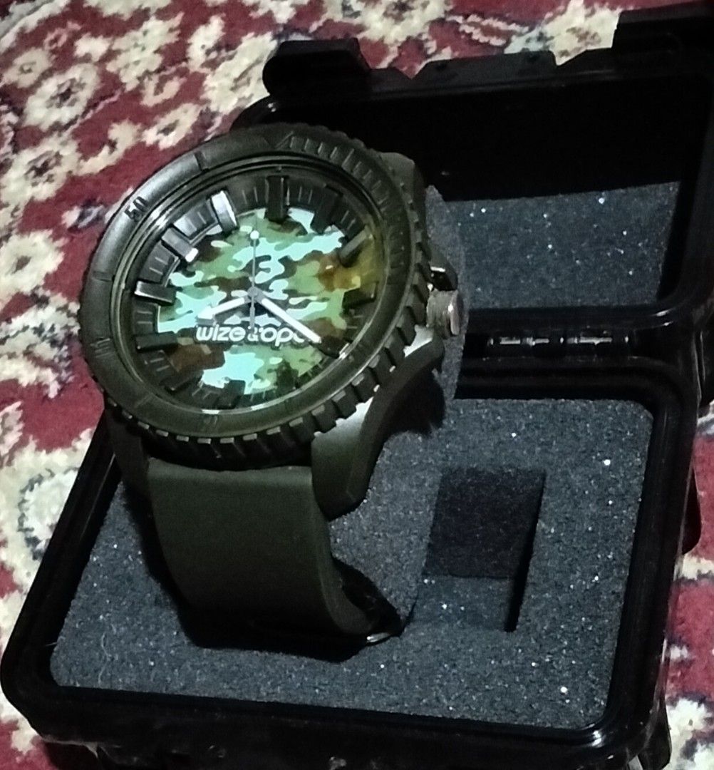 Wize & Ope “Earth Made” Camo Watch — Working – Needs Battery Replacement (Category: Luxury Watches) located in Manila. Submitted by svikayle (Listing ID 1458922405, Image 2). Description: • Never used / never worn • Kept stored in its case • Watch was working properly, but the battery has stopped due to long-term storage and needs replacement. • Original case included • Selling as-is • Unisex / Men's Style Price: ₱850 (still negotiable) ❗Reasonab