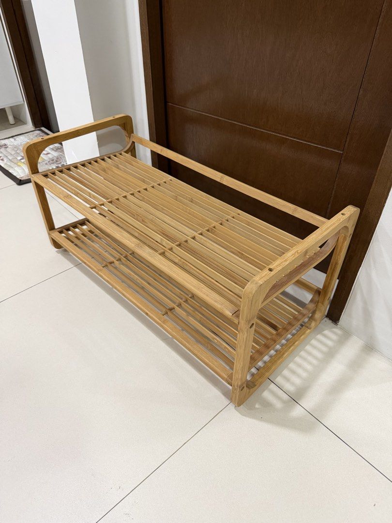 Imported Wooden 2-Tier Shoe Rack (Category: Shelves, Cabinets & Racks) located in Cavite. Submitted by jazz.shop (Listing ID 1459013540, Image 1). Description: - Made of durable bamboo - Features two spacious shelves - Convenient side handles for easy transport - Ideal for organizing shoes by the door or in closets - Simple, natural wood aesthetic complements any decor - Compact design fits easily into various spaces.