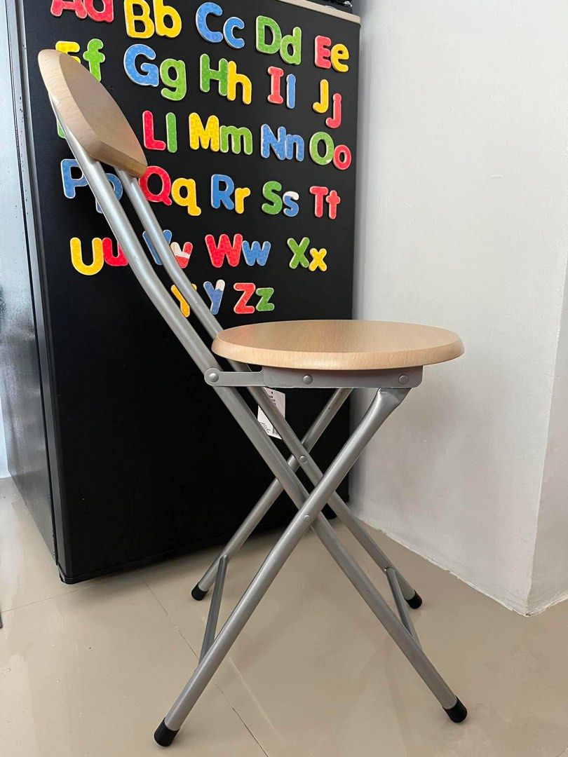 WOODEN FOLDING CHAIR (Category: Office Furniture & Fixtures) located in Quezon City. Submitted by zeline.seller (Listing ID 1459001584, Image 3). Description: FOLDING CHAIR *from Ace Hardware *wood laminated Original price: ₱599 Selling price: ₱399 Issue: none, good as new Reason for selling: wrong color .
