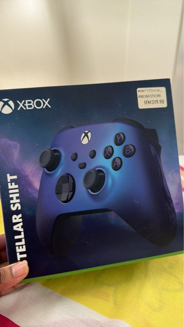 Xbox Wireless Controller - Stellar Shift (Category: Controllers) located in Kuala Lumpur. Submitted by pswizzlex0 (Listing ID 1458923002, Image 3). Description: - Xbox Wireless Controller - Stunning deep purple and blue iridescent finish - Black buttons and joysticks - Ideal for an enhanced gaming experience.