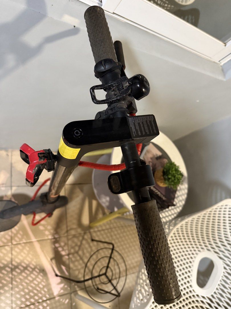 Xiaomi Mi Electric Scooter (Category: Skates, Rollerblades & Scooters) located in Manila. Submitted by angelaiza52734 (Listing ID 1459008605, Image 3). Description: - Xiaomi Mi Electric Scooter - Color: Black - Red cable protector on stem and front wheel - Minor dust and scuff marks from normal use - Handlebars with grips and bell - Ready for a new owner - Feel free to ask questions.