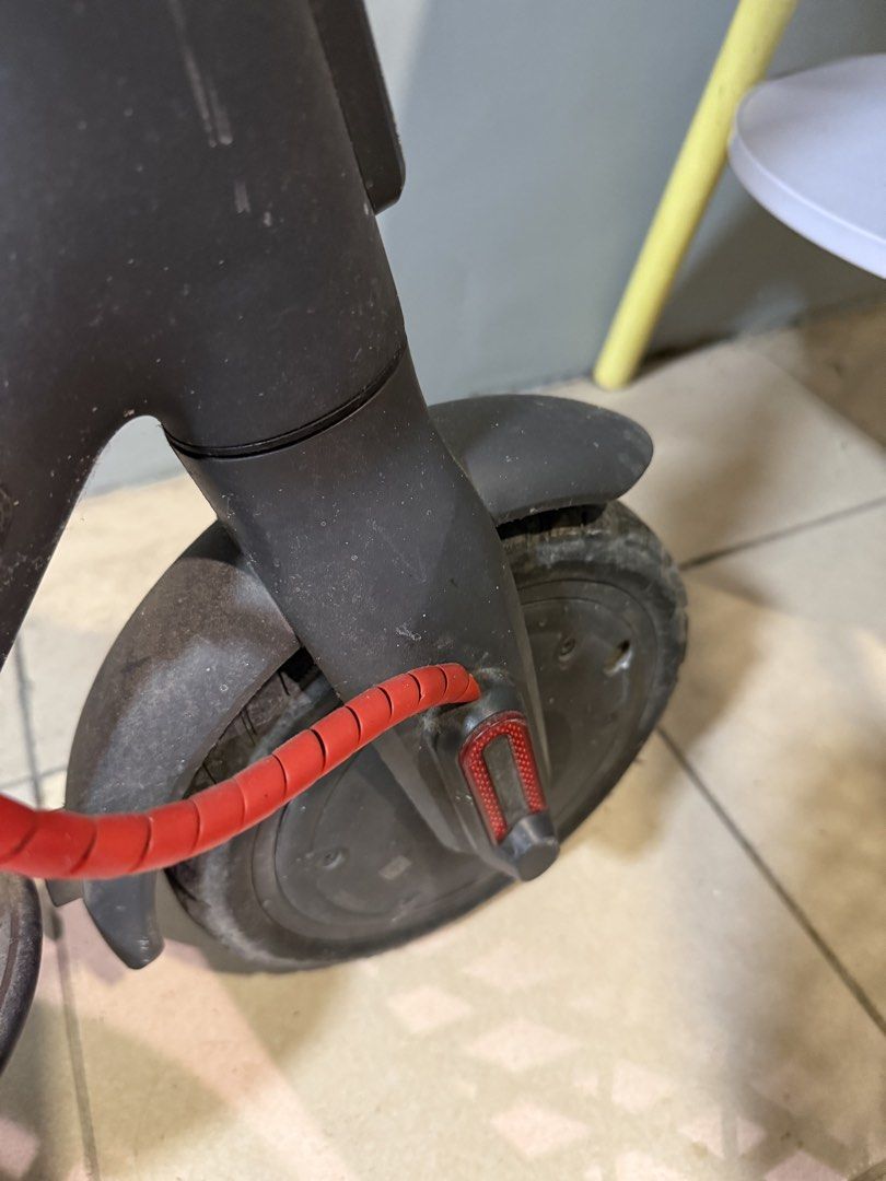 Xiaomi Mi Electric Scooter (Category: Skates, Rollerblades & Scooters) located in Manila. Submitted by angelaiza52734 (Listing ID 1459008605, Image 2). Description: - Xiaomi Mi Electric Scooter - Color: Black - Red cable protector on stem and front wheel - Minor dust and scuff marks from normal use - Handlebars with grips and bell - Ready for a new owner - Feel free to ask questions.