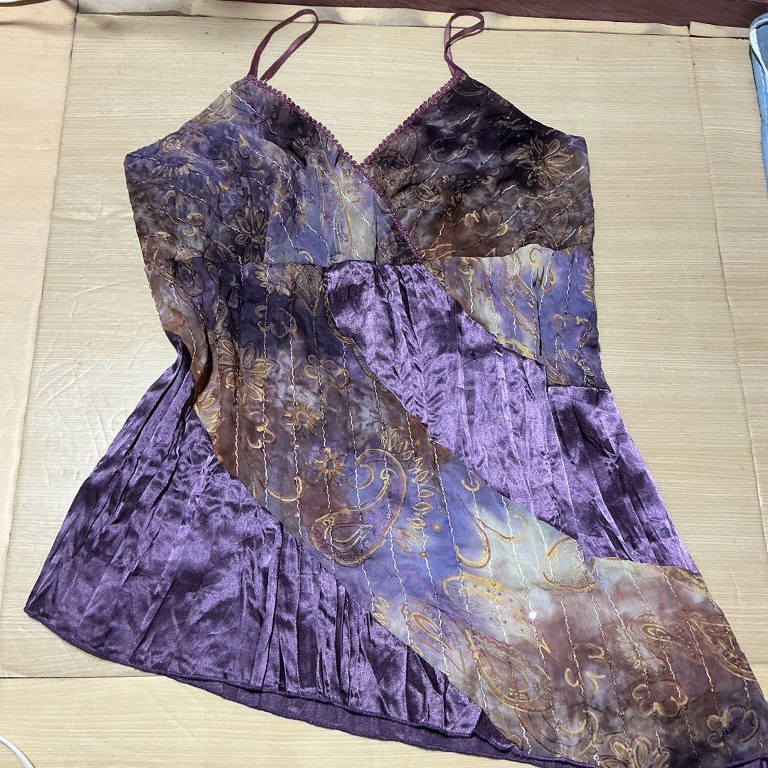 Y2K Patchwork Print Camisole Asymmetrical Top (Category: Sleeveless) located in Manila. Submitted by daisyparl (Listing ID 1458936556, Image 2). Description: - Unique patchwork camisole top - Mix of floral and solid purple prints - V-neckline with beaded trim - Adjustable spaghetti straps - Lightweight fabric, perfect for layering or solo wear - Fun and colorful addition to your wardrobe.