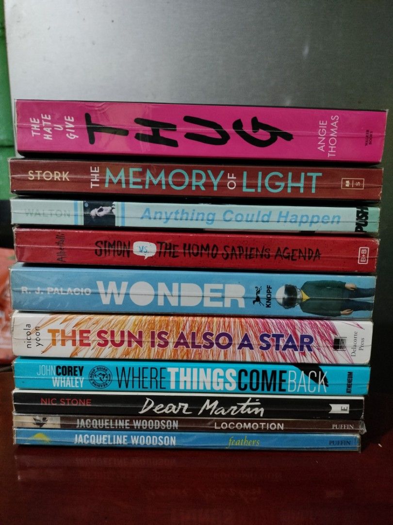 YA Fiction Bundle 2 (Category: Storybooks) located in Paranaque City. Submitted by _libryan (Listing ID 1459007316, Image 1). Description: Paperbacks in good condition, with visible shelf wear and light to heavy foxing. Payment first via GCash. Delivery via Grab, Lalamove, GGX, or LBC COP. SF will be shouldered by the buyer. Simon Vs. The Homo Sapiens Agenda • The Sun Is Also A Star • The Memory Of Light • Where Things Come Back • Dear Martin • F