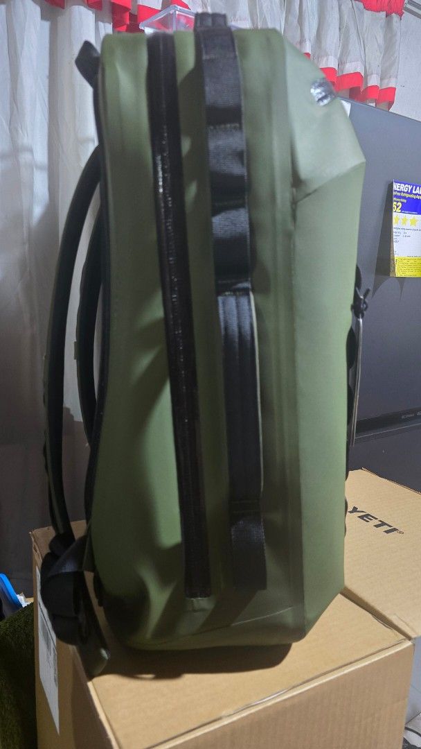 YETI Cayo Backpack 35L (Category: Backpacks) located in Manila. Submitted by medicopogi (Listing ID 1459077328, Image 2). Description: - YETI Cayo 35L Backpack Cooler - Color: Olive Green - Built for the elements: Waterproof zippers - Ample storage with MOLLE webbing for attachments - Ideal for outdoor adventures, durable and reliable.