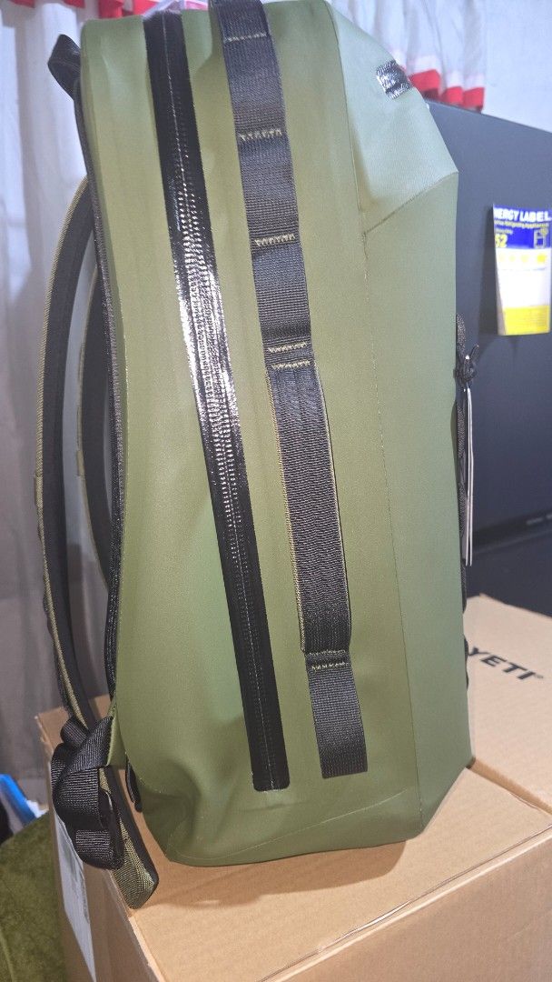 YETI Cayo Backpack 35L (Category: Backpacks) located in Manila. Submitted by medicopogi (Listing ID 1459077328, Image 3). Description: - YETI Cayo 35L Backpack Cooler - Color: Olive Green - Built for the elements: Waterproof zippers - Ample storage with MOLLE webbing for attachments - Ideal for outdoor adventures, durable and reliable.