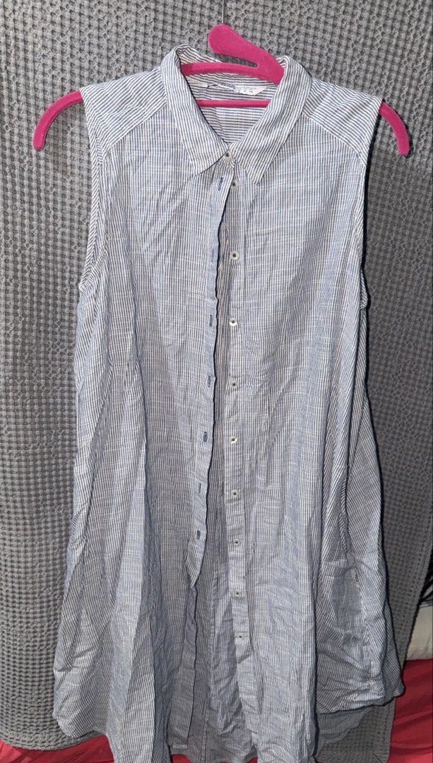 Zara Basic Striped Sleeveless Shirt/Dress (Category: Sleeveless) located in Makati City. Submitted by preciousthings05 (Listing ID 1459033795, Image 2). Description: - Ganda this one! - Zara Basic sleeveless shirt - Blue and white stripes - Button-up front - Size M - Made in Bangladesh - Ideal for casual wear or layering.