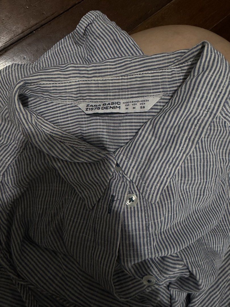 Zara Basic Striped Sleeveless Shirt/Dress (Category: Sleeveless) located in Makati City. Submitted by preciousthings05 (Listing ID 1459033795, Image 1). Description: - Ganda this one! - Zara Basic sleeveless shirt - Blue and white stripes - Button-up front - Size M - Made in Bangladesh - Ideal for casual wear or layering.