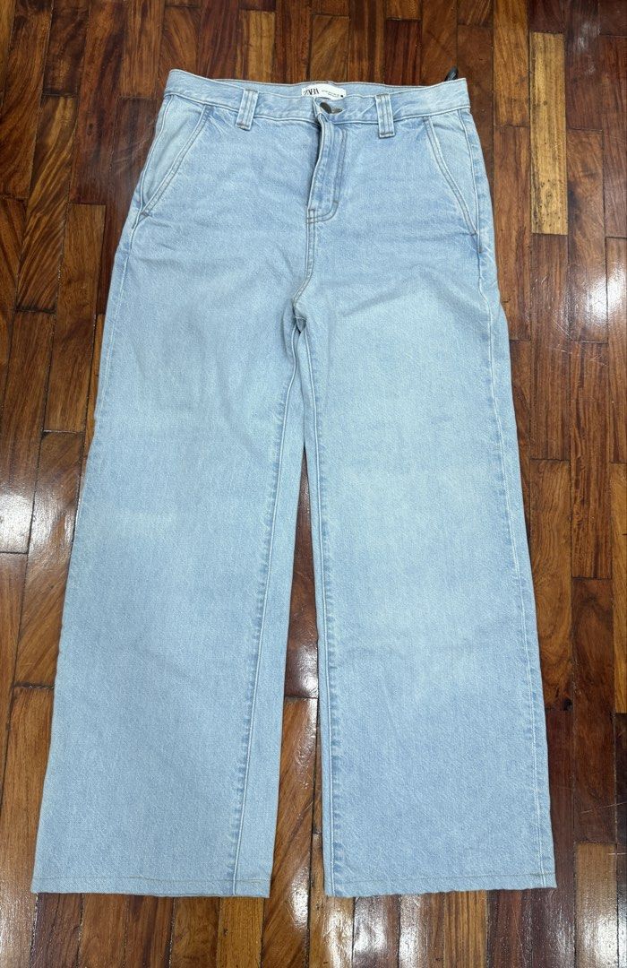 Zara Light Wash Wide Leg Jeans (Category: Jeans) located in Pasig City. Submitted by atbp__ (Listing ID 1459009752, Image 1). Description: - Zara light wash denim jeans, altered to length 41 - Wide leg cut for comfort, waist is 32 - Classic five-pocket styling - Button and zip fly closure - Made in Egypt - Ideal for casual outfits.