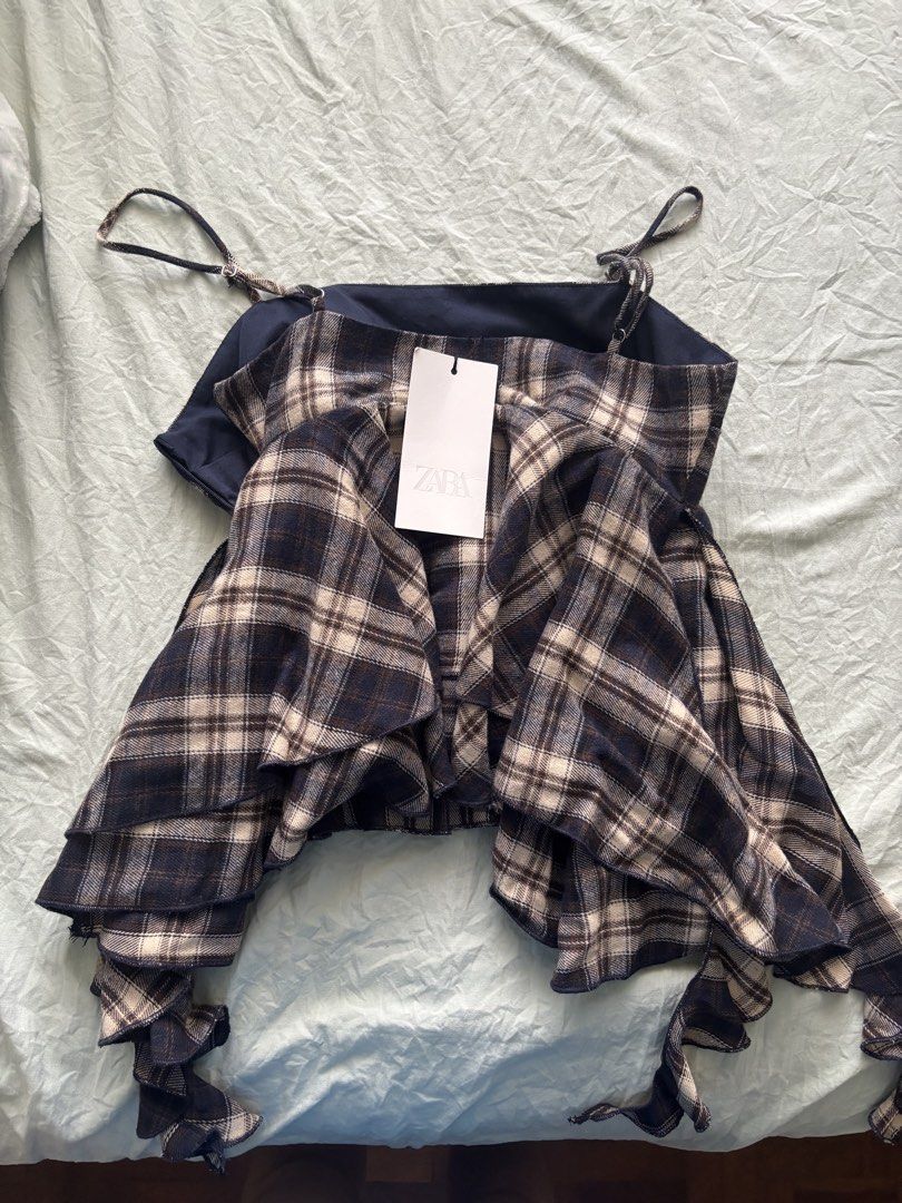 Zara plaid ruffle top (whimsy y2k) (Category: Sleeveless) located in Makati City. Submitted by cvec0409 (Listing ID 1458931848, Image 2). Description: cute zara ruffle top with flowy pieces size xs tag still on! never been used bought for 2395 pesos super cute when worn ^^ #aesthetic #ibiza #lfb #y2k #whimsy.