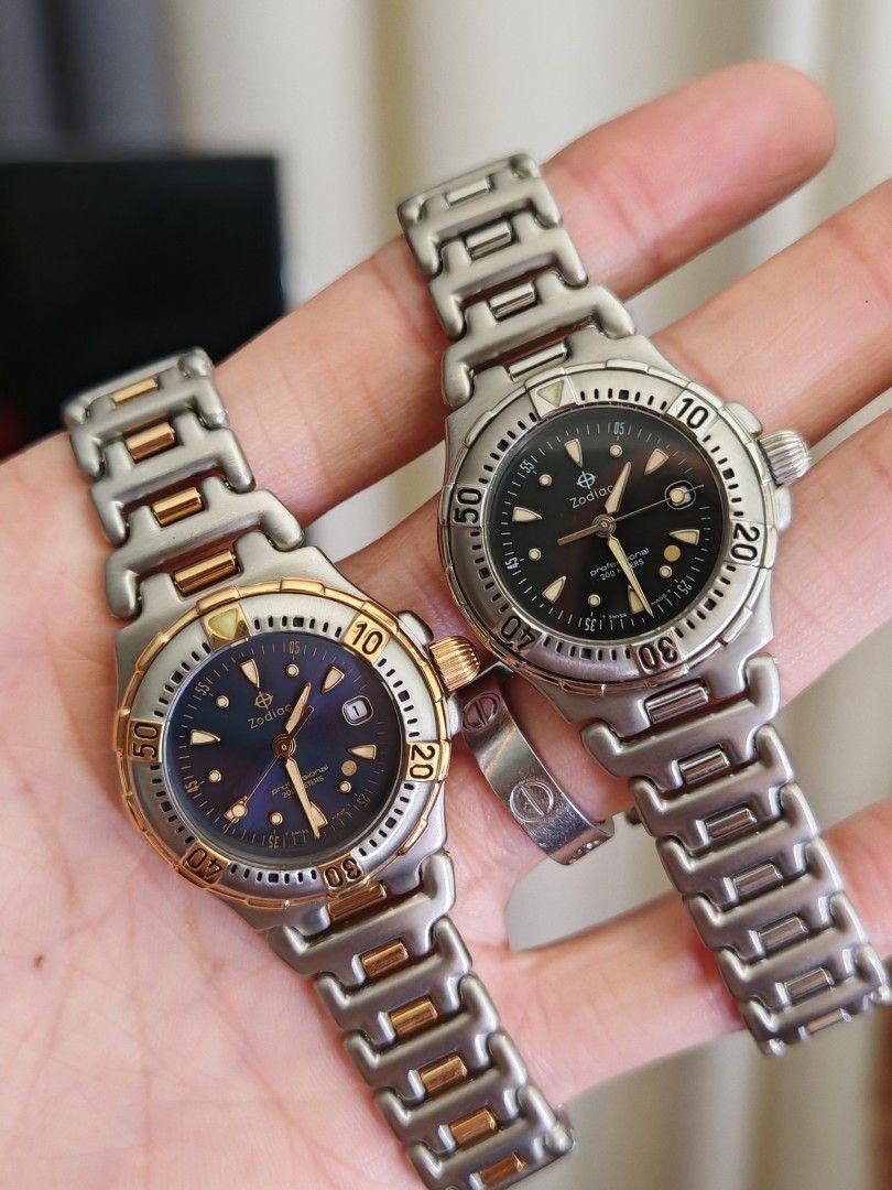 Zodiac ladies professional 200 28mm (Category: Women's Watches) located in San Juan City. Submitted by MW_888 (Listing ID 1458934766, Image 2). Description: Steel / black face - 1pc left Two tone / blue face - 1pc left Zodiac Professional 200 28mm Swiss quartz (identical movement as Tag heuer) 9.5/10 condition (New old stock) Inclusions: watch, original steel bracelet fit to approx 7.5" wrist and watch case *photo reference on 6.5" wrist 18k.