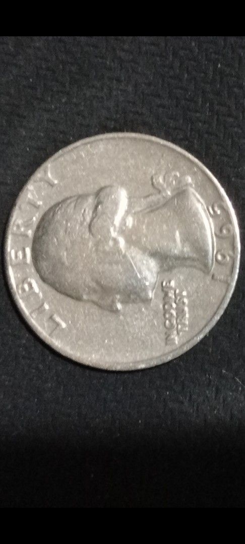 1965 US Quarter Coin - Liberty (Category: Currency) located in Manila. Submitted by luckyeagle-7ff8 (Listing ID 1460746010, Image 2). Description: - 1965 US Quarter - Features George Washington on the obverse - Clearly visible year '1965' - Collectible coin for numismatists - Great addition to any coin collection.