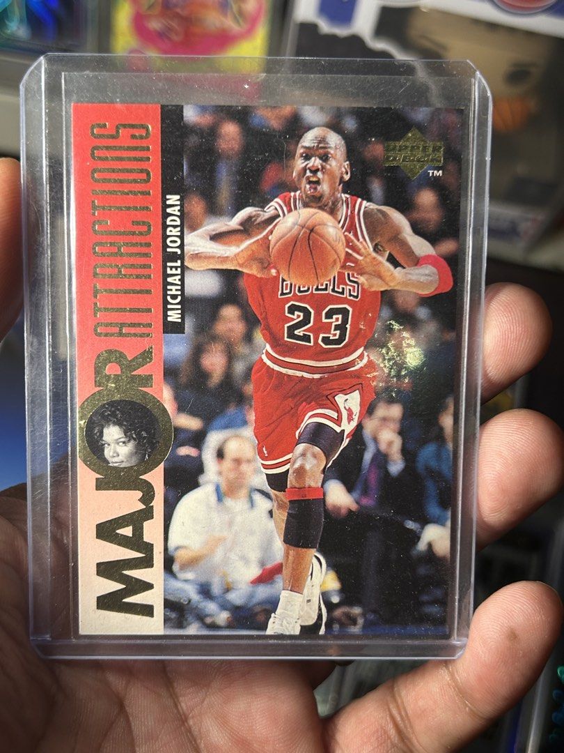 1993 Upper Deck Michael Jordan Major Attractions Card (Category: Vintage Collectibles) located in Iloilo. Submitted by jackpot.treasures (Listing ID 1460727459, Image 1). Description: - 1993 Upper Deck Michael Jordan Major Attractions basketball card - Features Michael Jordan in his iconic Chicago Bulls jersey - Card is in a protective sleeve for preservation - Excellent addition to any basketball card collection - Don't miss this classic piece o