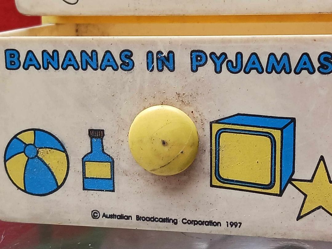 BANANAS IN PYJAMAS 1997 Vintage Drawer (Category: Vintage Collectibles) located in Manila. Submitted by mickey_salonga (Listing ID 1460737813, Image 2). Description: - Adorable Bananas in Pyjamas themed storage box. - Features three convenient drawers for organization. - Includes a handy top handle for easy carrying. - Made of durable yellow plastic. - Copyrighted 1997 by Australian Broadcasting Corporation. - Ideal for storing small items like s