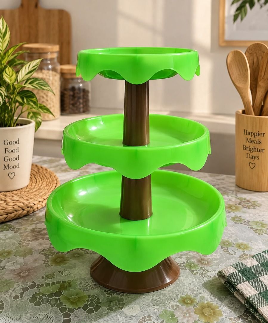 3-Tier Green Fruit & Snack Stand / Rotating Organizer (Category: Food Organization & Storage) located in Taguig. Submitted by rosesofpositivity123 (Listing ID 1460868048, Image 1). Description: A practical 3-tier stand that's great for organizing and displaying fruits, snacks, sweets, condiments, or other small items. ✨ 3 spacious tiers ✨ Bright green color ✨ Stable brown base ✨ Great for kitchen, dining area, pantry, or countertop.