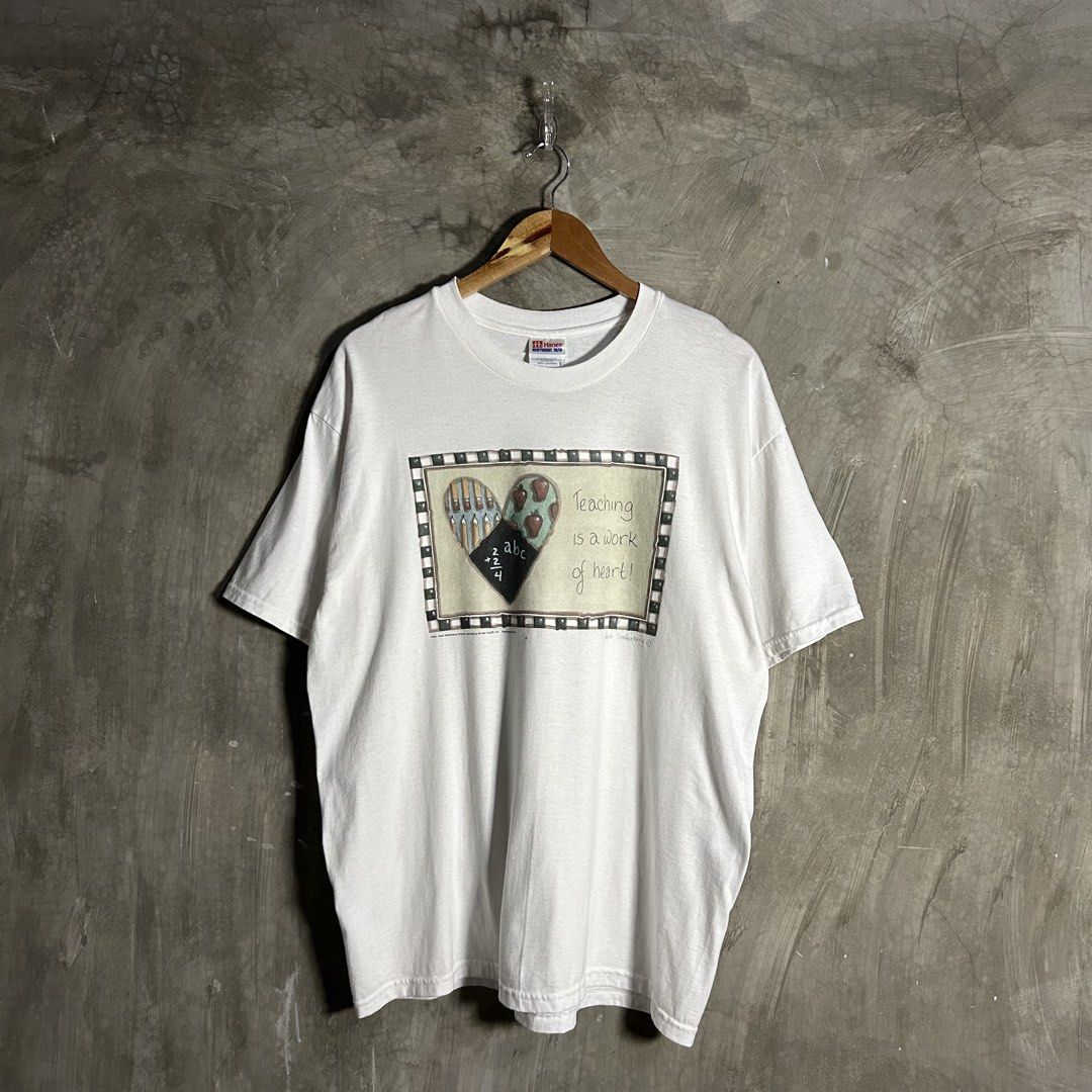 90’s Teaching Is A Work Of Heart Tee (Category: Tshirts & Polo Shirts ) located in Tayabas. Submitted by streetdepartment (Listing ID 1460904492, Image 1). Description: 90’s Teaching Is A Work Of Heart Tee Measurements (inches): Width: 22.3” Length: 29.3” Tagged as Large Excellent condition Flaw/s: minimal hairlines & dot stain .